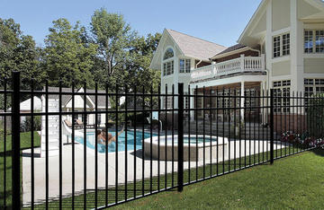 black metal fence with pool