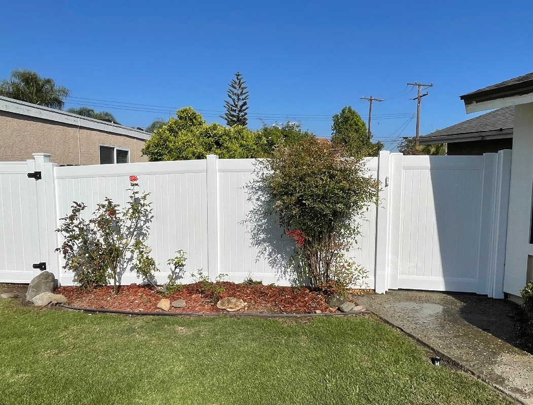 white fence with door